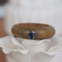 Natural Elements: Fragrant  Guaiac Wood Ring With 925 Sterling SilverSetting with Natural Tanzanite Oval Faceted US size 8 - Thumbnail 1