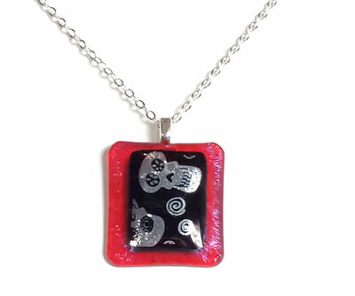 Dichroic Skulls on Red Fused Glass Necklace