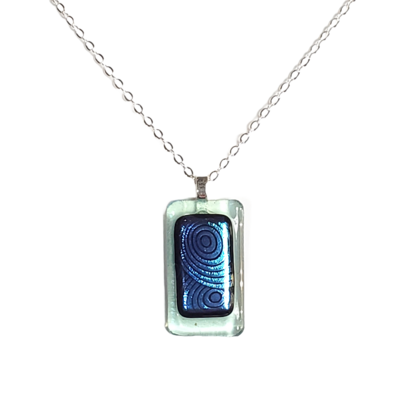 Blue circles on transparent ming green fused glass necklace