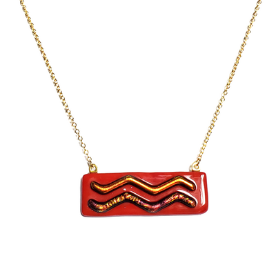 Dichroic red waves on red fused glass bar necklace