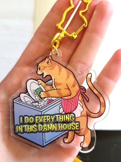 Tired cat charm